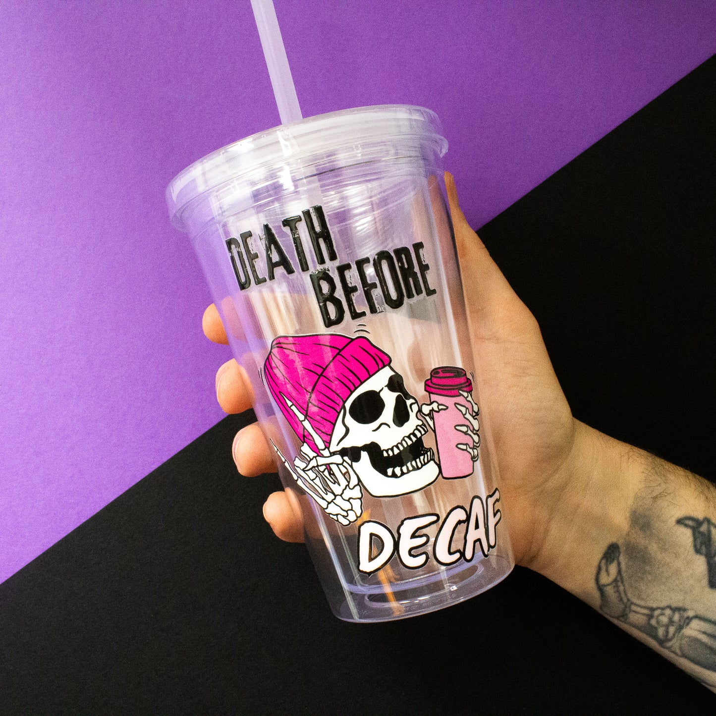 Reusable ÔDeath Before DecafÕ coffee tumbler with straw, featuring a spooky skeleton design, ideal for Halloween and coffee lovers.