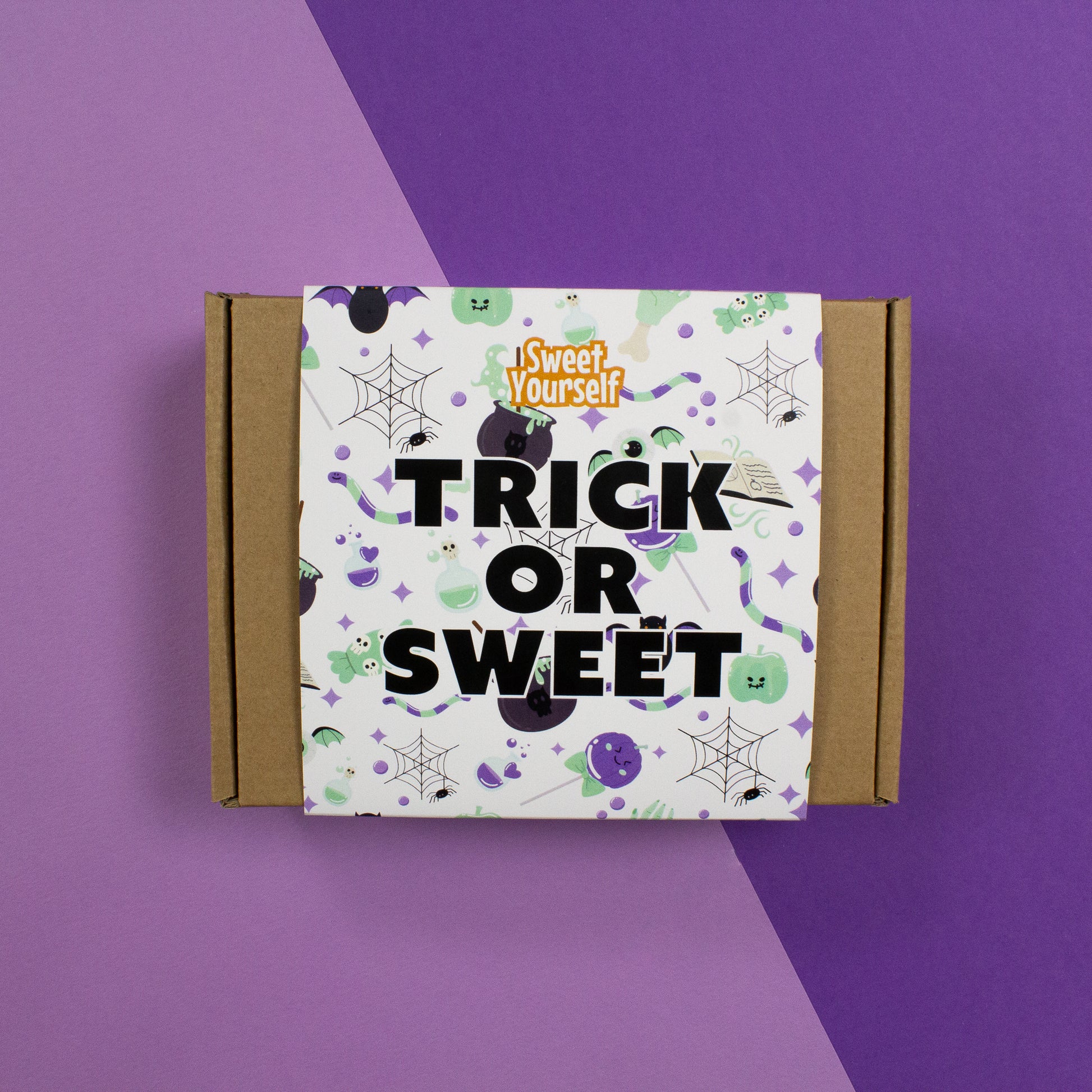 Trick or Sweet Halloween gift box filled with plant-based vegan sweets, perfect for gifting or sharing during the spooky season