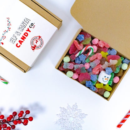 Festive sweet boxes for kids, Packed by elves Christmas gifts, Christmas candy boxes with marshmallows, Plant-based Christmas sweet treats, Stocking fillers for children UK, Christmas Eve box ideas for kids, Sweet treats with peppermint candy canes, Gluten-free festive candy boxes, Unique sweet gifts for kids at Christmas, Fun edible Christmas gifts UK