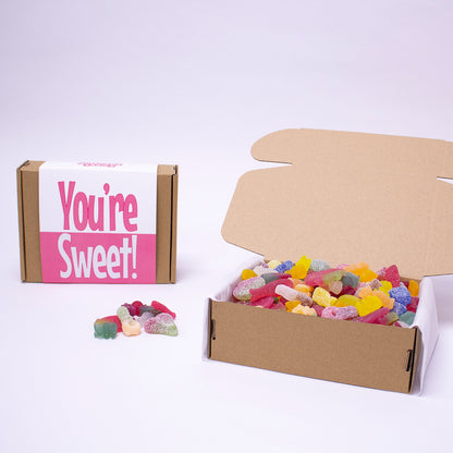 Indulge in a box full of vegan gummy and fizzy sweets, perfect for sharing or as a thoughtful gift. Packaged in eco-friendly, recyclable materials, this sweet box is ideal for any occasion. Enjoy a variety of plant-based treats while staying sustainable.